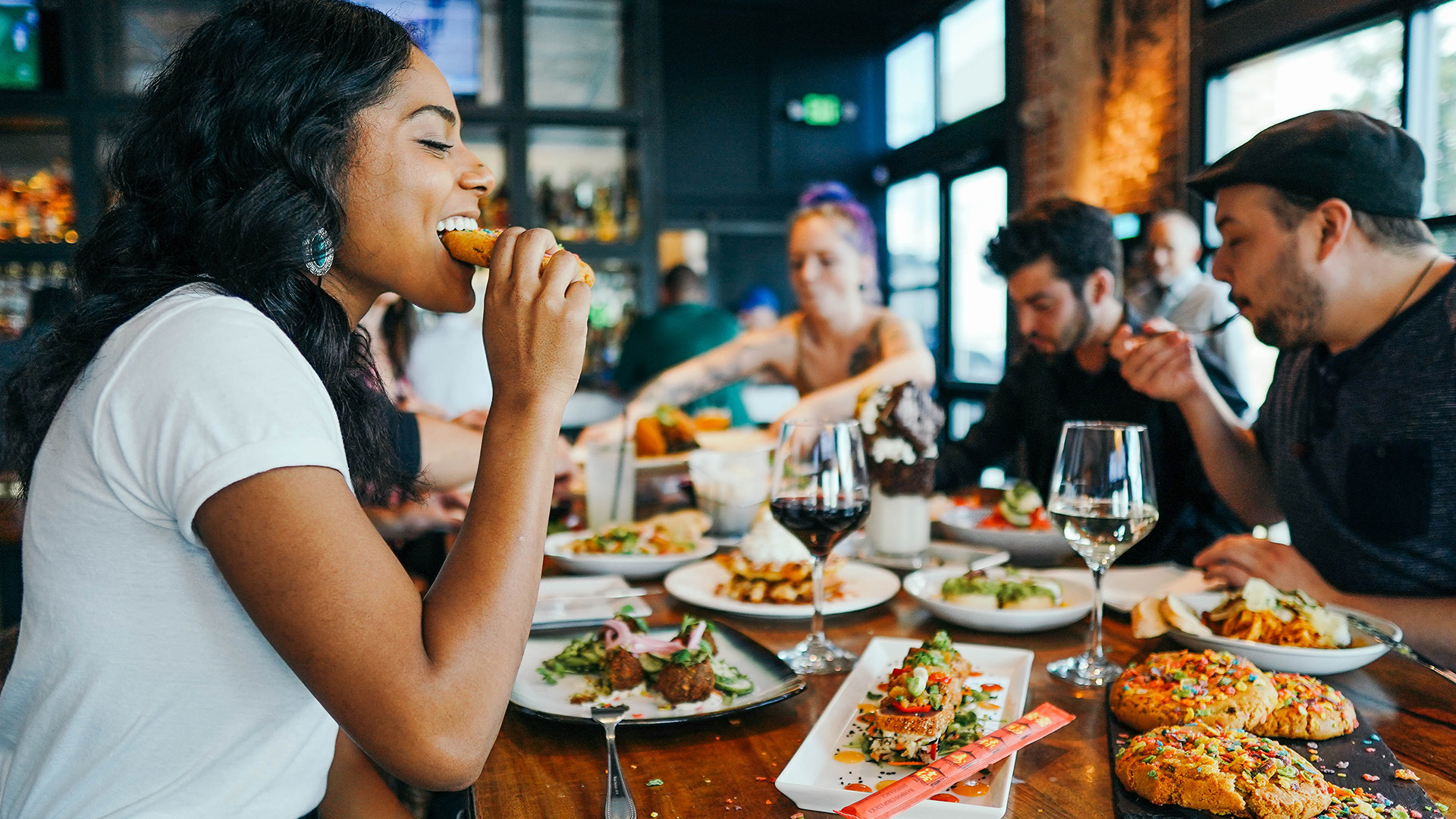 People eating together at a restaurant.