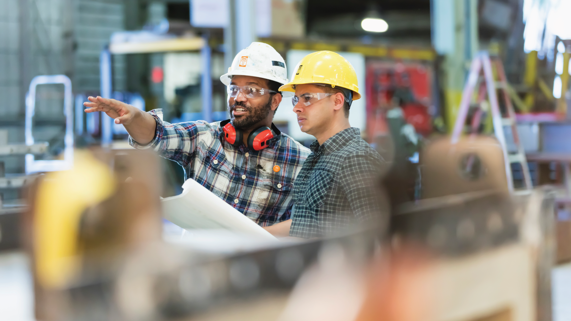 Image of construction workers wearing Safe T campaign helmets.