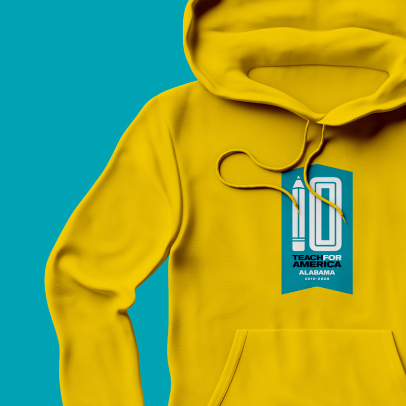 Cropped image of a yellow hoodie that has the Teach for America Alabama 10th anniversary logo on it.